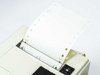 Citizen CBM iDP3530 tractor feed mechanism close-up – sprocketed continuous paper loaded on tractor sprockets