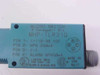 Micro Switch MHP-TLR31Q label showing model number, 10-30VDC, NPN 250mA pinout, UL and CSA certifications, Made in USA