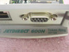 HP Jetdirect 600N Token Ring J3112A model label closeup showing DB9 port and RJ-45 port on faceplate