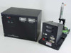 HSA Model 10 Domain Aligner full system front view – power supply unit at left with analog meters, pneumatic actuator stage at right on black base