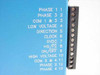 Anaheim Automation DPY65352 – motor connector label panel showing 13 pins: PHASE 1-4, COM 1&3, COM 2&4, LOW/HIGH VOLTAGE, DIRECTION, CLOCK, 0VDC, HS/FS, ON/OFF