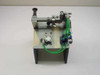 SMC pneumatic tolerance checking fixture front-left view showing aluminum frame, green pneumatic tubing, and SMC cylinder assembly
