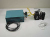 Analogic Measurometer II system – alternate angle showing teal analog controller enclosure, air regulator, and pneumatic actuator stage