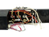 CRD-1410-DF interior rear view showing fluid manifold block, solenoid valves, red and white tubing, and loose wiring harness