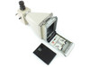 Olympus PM-10AD camera with Polaroid back door open and black film cartridge removed — top-angle view of loading chamber