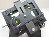Top-down view of custom optical stage assembly showing four circular optical apertures and two yellow indicator LED positions