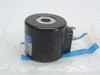 Magnet-Schultz Memmingen X AP X044 K54 D11 solenoid coil in original plastic bag, front view showing cylindrical black housing with blade terminals
