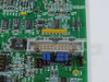 Guzik UP-205 PCB closeup of multi-pin white housing connector, DIP switches, and IC components on board corner