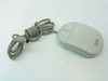 IBM 13H6690 two-button PS/2 ball mouse, light gray, right side and top view with coiled cable