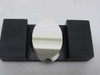 Spindler and Hoyer NL precision optical mirror fixture – close front view showing polished circular mirror disk fully seated in black U-cradle, mirror surface detail visible