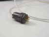 Multi-pin circular signal connector at end of braided cable included with Daedal pneumatic clamp assembly