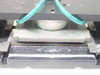 Mack Corp S1014-2 Bonder Assembly – close-up of cylindrical pneumatic actuator puck with label showing P/N and Mack Corp Flagstaff AZ markings