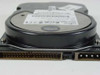 Fujitsu MPB3064AT 6.4GB IDE hard drive — close-up of IDE ribbon and power connectors