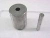 South Bay Technology sectioning saw die component — tall hollow cylindrical die body and separate steel punch rod on acrylic surface