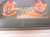 Sony DG5CL Cleaning Cartridge close-up — detail view of dual orange reels and DG5CL model number printed on cartridge body