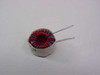 Eaton CTX50-2-52 Fixed Toroidal Inductor – top-angled view showing red enameled copper winding on ferrite toroid core with two through-hole leads