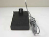 Unbranded digital remote cash register display — rear/bottom view showing black base and mounting bracket with cable