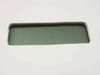 Close-up of LCD display window on unbranded cash register customer display — green-tinted rectangular screen