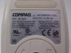 Compaq M-S34 141189-401 bottom label showing model number, spares part number, 5V 15mA rating, FCC ID DZL211029, UL and CE markings, Made in China