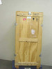 Heat treated wooden shipping crate front door view showing butterfly latches, fragile sticker, and handling symbols — 999-Packbox rack box on 4x4 skid