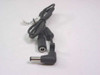 DC barrel extension cable 295945-001 showing both the female barrel jack and right-angle male barrel plug ends