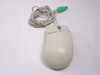 Microsoft IntelliMouse X04-72169 PS/2 3-button mouse — top view showing Microsoft logo, gray scroll button, and PS/2 connector