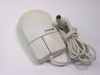 Microsoft 92841 MUS4J beige PS/2 ball mouse — left-side view showing Microsoft logo and two-button top