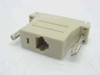 DB25 Male to RJ45 Female serial adapter — reverse side showing RJ45 8-pin female modular jack and thumbscrew retaining posts