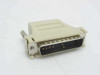 DB25 Male to RJ45 Female serial adapter — angled view showing DB25 male 25-pin connector face with gold pins and beige plastic housing