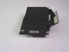 Microscan MS 1200 STD FIS-1200-0001 laser barcode scanner — left side view showing white label and mounting bracket