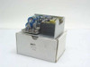 Sola SLS-05-060-1 Regulated Power Supply shown removed from its original white cardboard box, front and top view