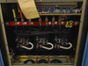Topaz MN1C-AD075 – transformer compartment interior showing H1–H4 and X1–X2 terminal bus bars, primary and secondary winding connections, and three-phase transformer core
