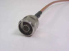 ESM Cable Corp RG-400 close-up of N-Male (N-Type Male) connector — silver machined body with center pin visible