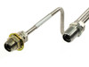 CTI Cryogenics 8143122 helium compressor line — close-up of threaded male NPT compressor-side fittings showing flange mount and hex detail
