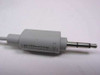 Apple 590-0670 microphone 3.5mm plug close-up showing part number label on connector housing