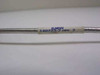 Label on KMW 140223-2 Rev 2 coaxial cable showing part number and revision marking on white label affixed to cable body