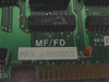 MFX MF/FD 6X00852 close-up of PCB label showing MF/FD and MFX 6X00852 part number, Texas Instruments TBP28L22N IC, and REV D marking