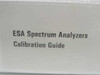 Agilent ESA Spectrum Analyzers Calibration Guide — close-up of cover label reading 'ESA Spectrum Analyzers Calibration Guide' visible through plastic wrap