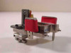 Guzik 304000 HLM head sub-assembly – front view showing two red-capped magnetic head modules in precision machined bracket