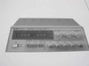 HP E3630A Triple Output DC Power Supply front panel photo printed inside the manual showing controls, meters, and output terminals