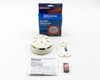 Radio Shack 49-466 Smoke Detector with original box, mounting bracket, instruction manual, and 9V battery laid out on white background