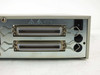 Ci Designs Ci 1000 SCSI enclosure – close-up of dual 50-pin Centronics SCSI rear connectors with retention clips and SCSI ID selector switch
