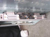 IBM AS/400 21F5758 – underside view showing SCSI and data/I/O port connectors along the bottom of the chassis