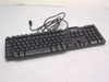 Dell RT7D50 0W7658 104-key thin black USB keyboard – top view showing full key layout and attached USB cable