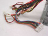 Power Man FSP235-60GT ATX power supply – close-up of output wiring harness including 20-pin ATX main connector and Molex leads