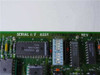 Dataproducts Serial I/F Assy PCB – close-up of board silkscreen showing SERIAL I/F ASSY 272142-001 REV B and National Semiconductor DM74154N chip
