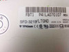 TriGem SFD-321B/LTGND floppy drive bottom label showing model number, DC 5V 0.7A power rating, FBT1 and P4ILA070107 part numbers, and CE/UL/TUV certifications