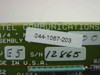 CCTel card close-up showing part number label 044-1067-203, Rev E5, S/N 12865, Octel Communications silkscreen