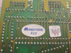 Magitronic 615 label on reverse side of ISA card PCB showing solder side traces and board identifier sticker