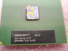 Intel Celeron SL4PA CPU – close-up of label showing Celeron 633/128/66/1.7V markings, lot code Q848A886-1613, and sSpec SL4PA; thermal compound residue visible on IHS